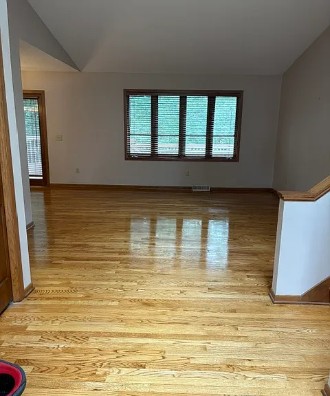 Vaulted ceiling living room. View at entry.