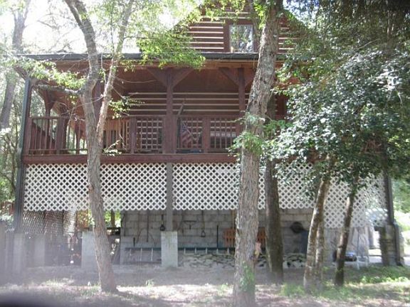 House side wraparound covered porch