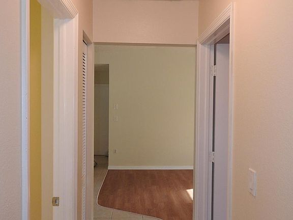 Hallway between bathroom and bedrooms