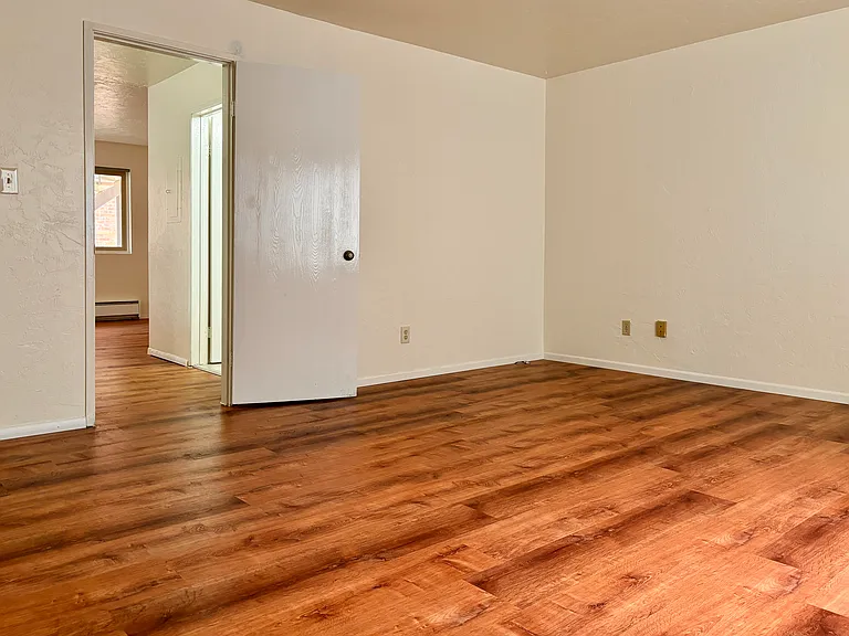 Bedroom with beautiful hardwood floors