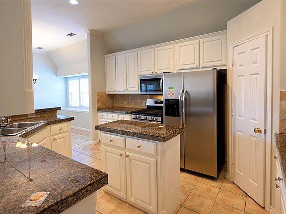 3rd image of 7410 Woodsprings Dr