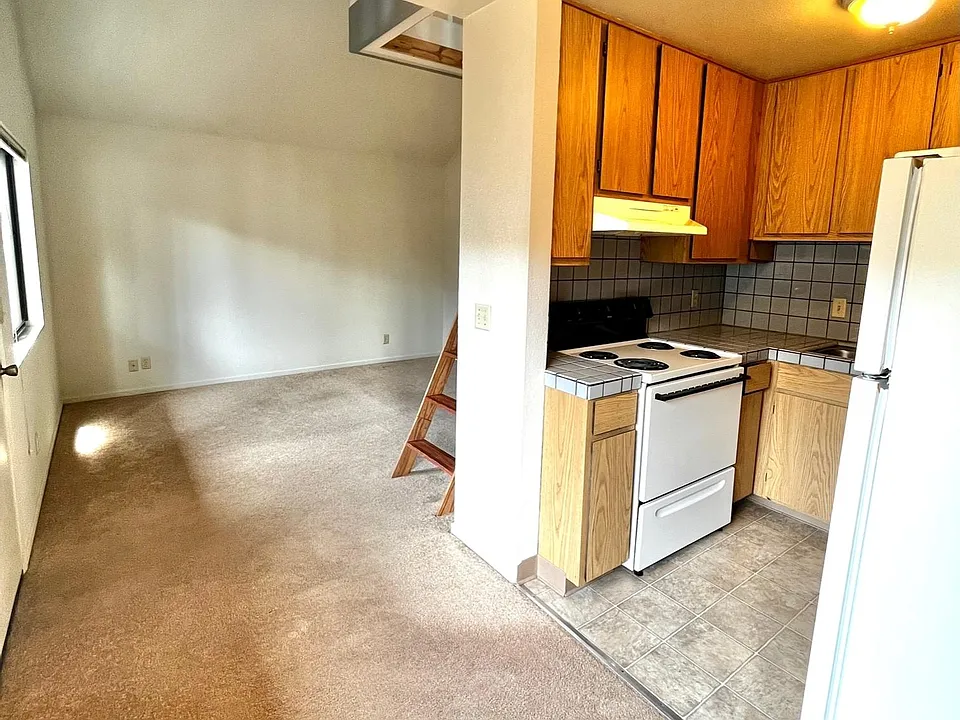 Dining area, facing kitchen & living room.