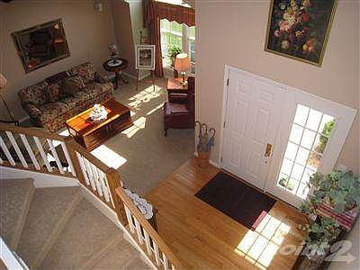 Looking down into foyer from upper level.