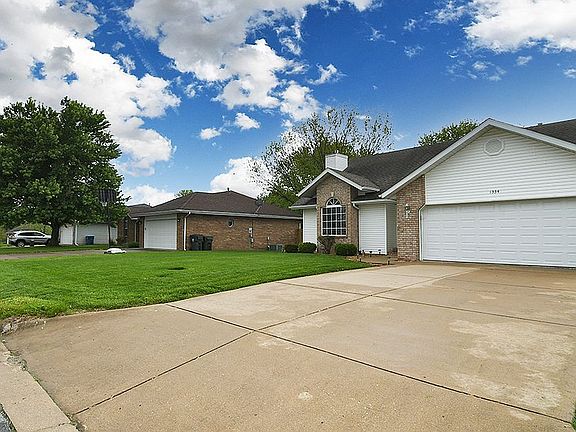 2-Car Garage and Large Drive