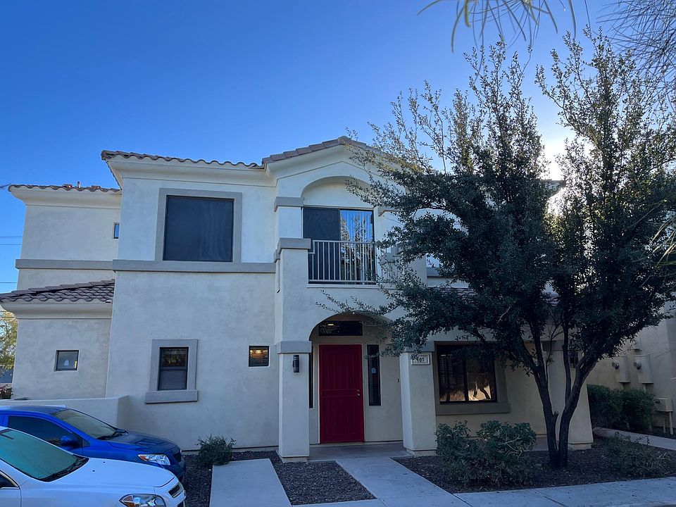 Front of Condo with lower level patio