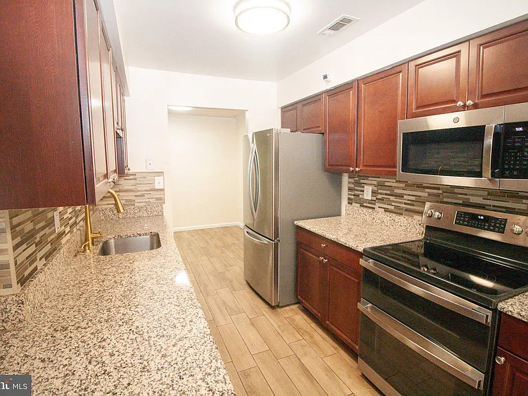 11325 Halethorpe Ter #207 — Photo 7