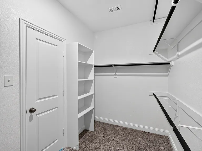 Primary walk-in closet