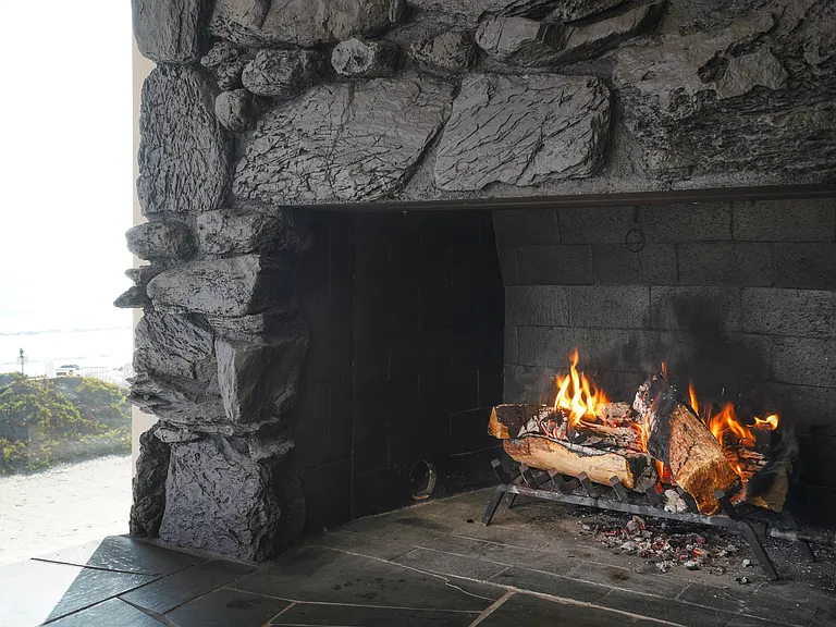 Settle in by the fire and let the crackling warmth complete your evening.