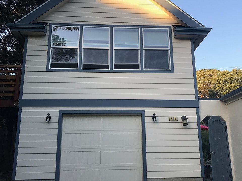 Front of the apartment, above the garage