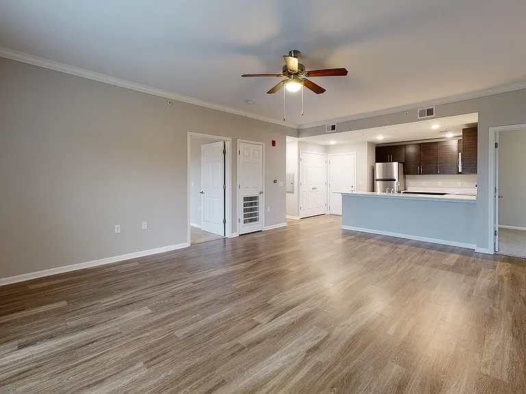 The Redbud floor plan is an open-concept layout with the shared living space between two bedrooms. The Redbud floor plan is an open-concept layout with the shared living space between two bedrooms.