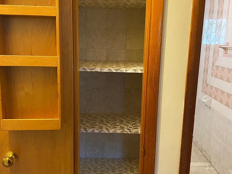 Linen - Storage Closet outside the Main Bathroom