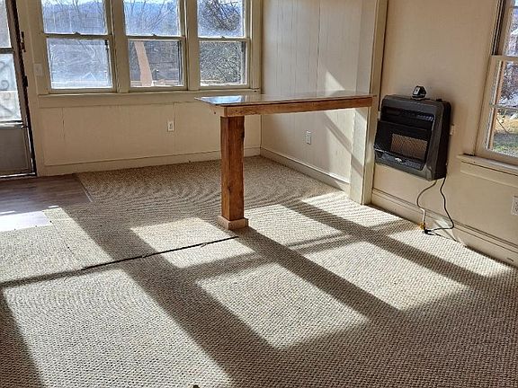 Living room with new bar that separates living and dining