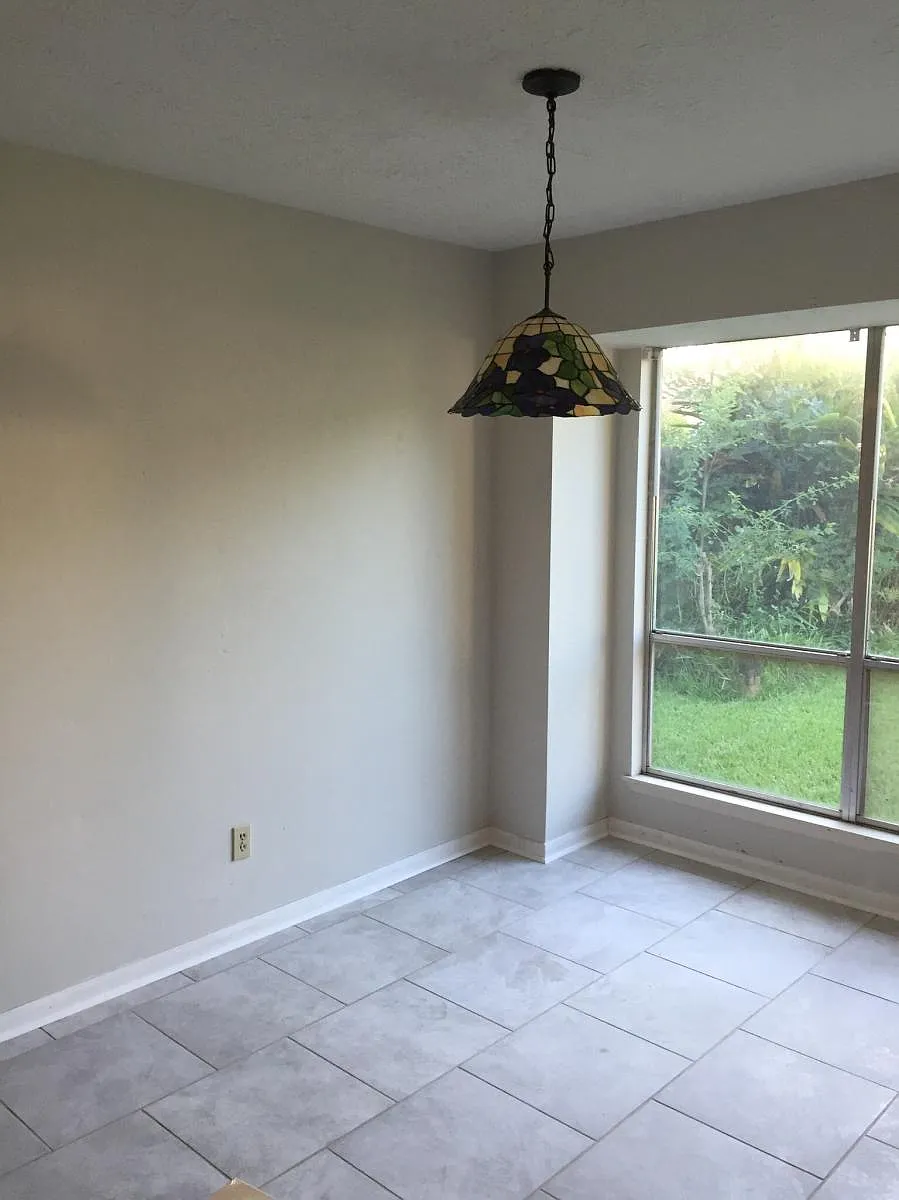 Dining area featuring new tile - 15915 Echo Hill Dr