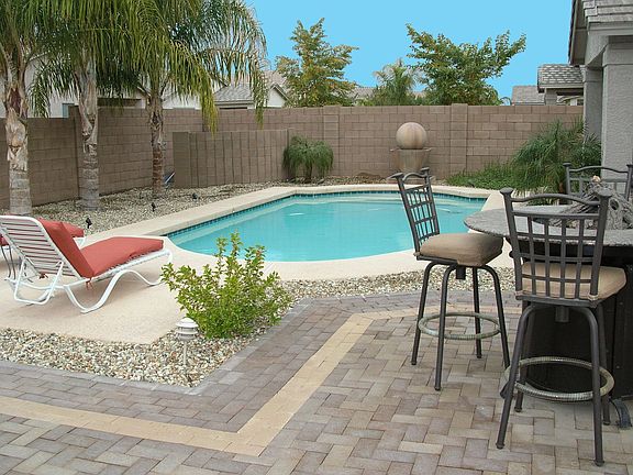 Stunning Resort-Like Yard w/Pool, Fountain, Misting System, Built-In BBQ!