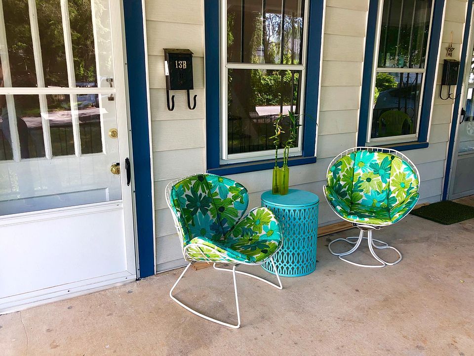 Front porch wide enough for seating and enjoying. Mostly in the shade, so it remains cool in the summers.