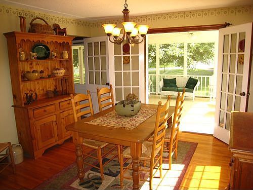 DR with frinch doors open to Porch 