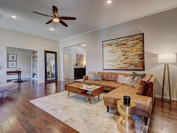 Living room open to office and formal dining room
