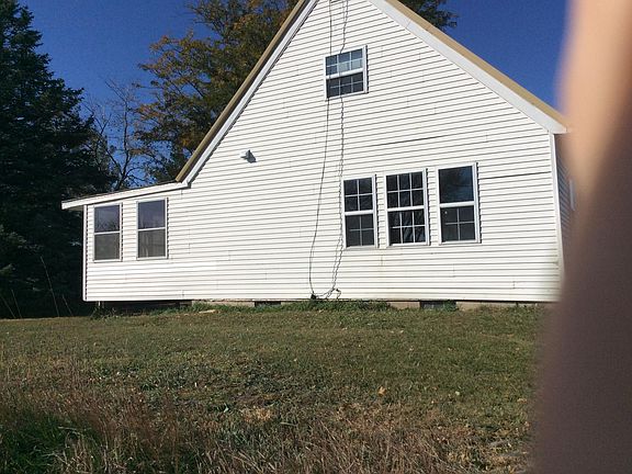 East side of house, living room windows & 2nd story bedroom