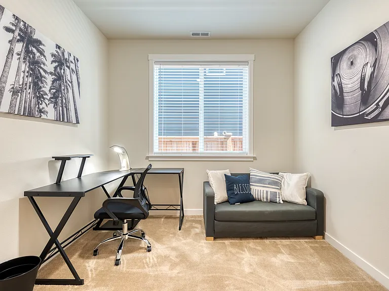 Private Office downstairs with its own separate room with doors. Can also be used as a bedroom since the chair/couch can fold out into a twin bed.