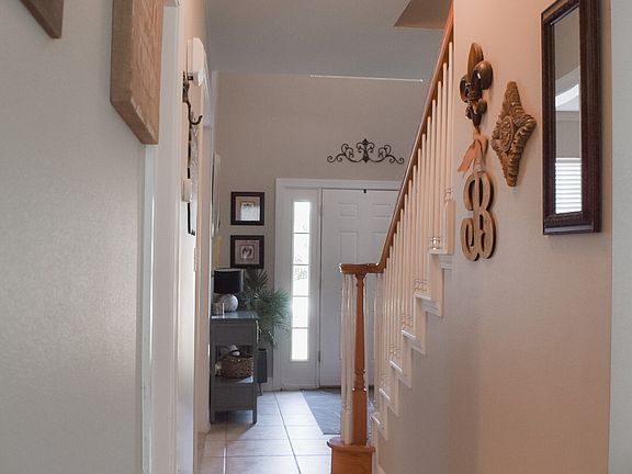 Foyer leads to den/kitchen