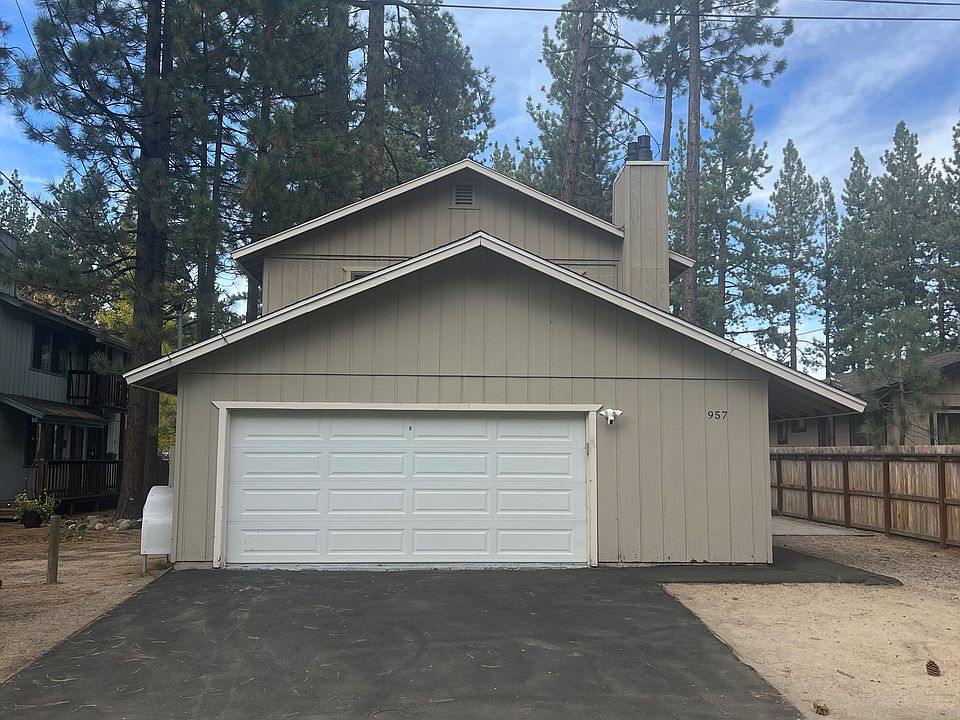 Two car garage with epoxy floors. Second parking space in parallel with garage space.