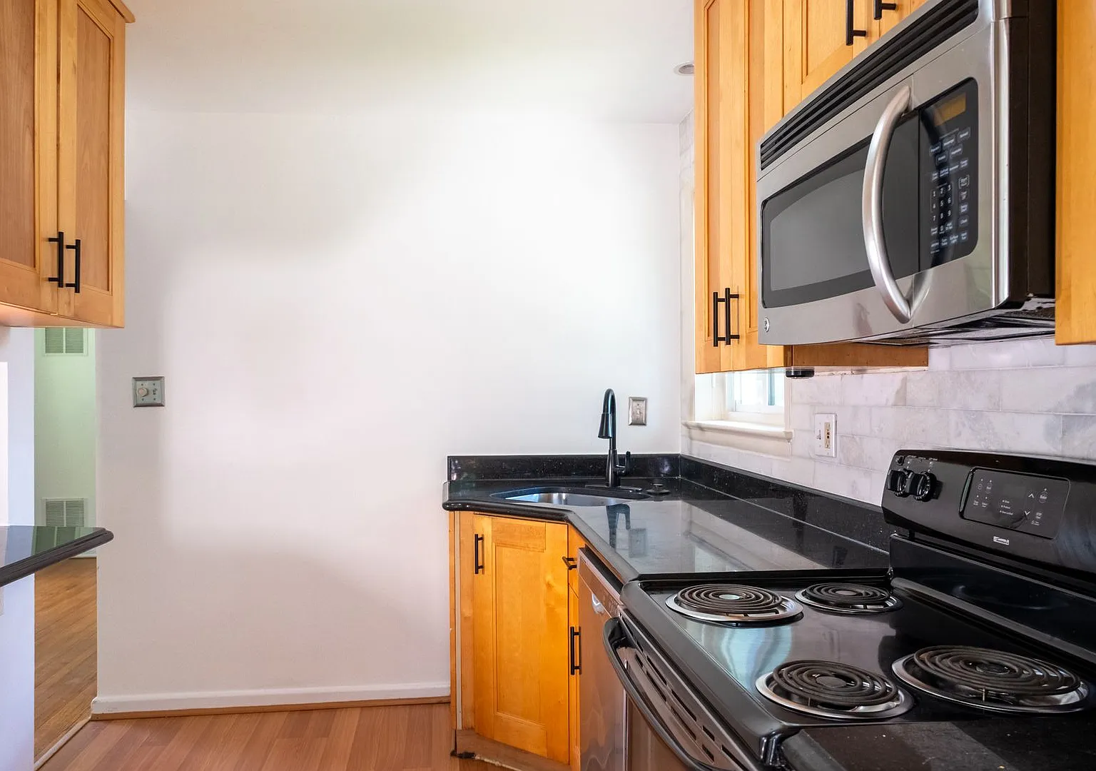 Charming Split-Level Home with Bright Interiors and Spacious Backyard — Photo 3