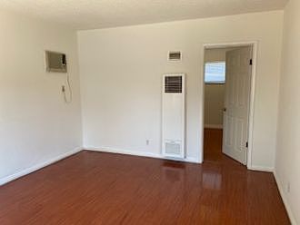 Entry into the living room with wall AC