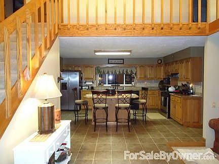Foyer
						:
						Two-Story Foyer with custom oak railing