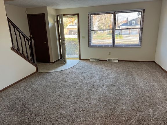 Front entrance room with coat closet
