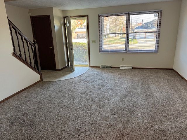 Front entrance room with coat closet