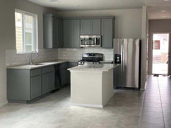 Beautiful chef's kitchen with included Refrigerator