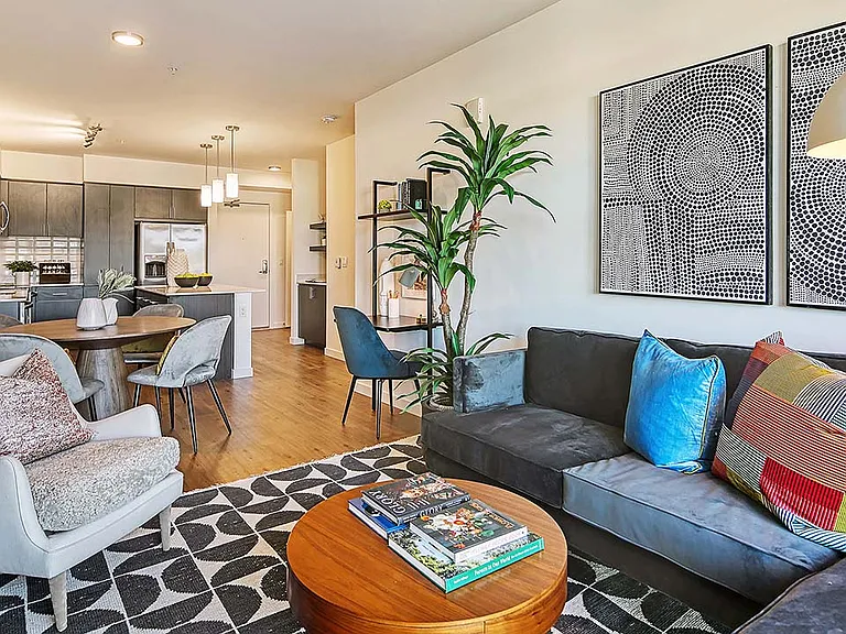 Griffis Shoreline apartment living room with wood style floor.