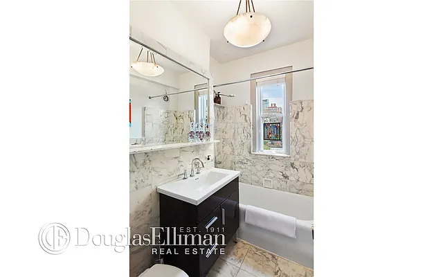 Sold by Douglas Elliman | media 17