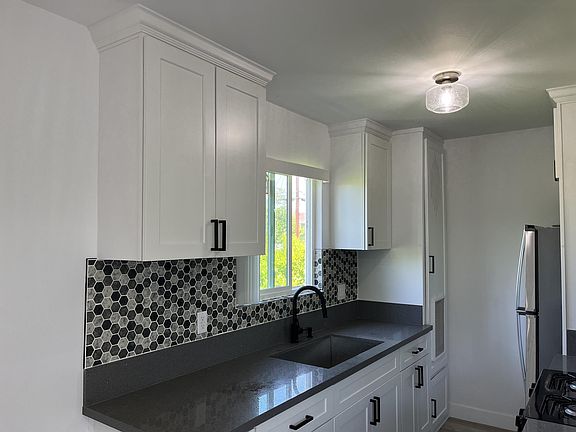 5th image of 6033 Barton Ave
