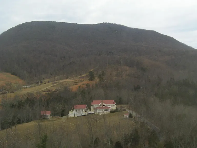 This is a photo of Hawkridge Farm on House Mountain. The Pool House is located to the left of the Main Home, shown here.