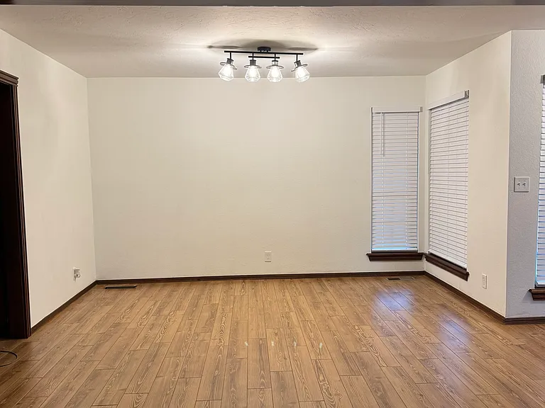 Variety of uses formal dining room, office, playroom, large enough for pool table