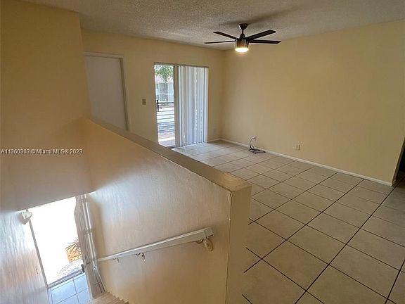 4th image of 701 Gardens Dr APT 203