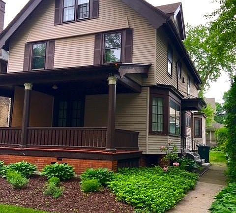 Private entrance with slate patio.