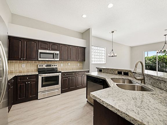5th image of 6012 Newport Village Way