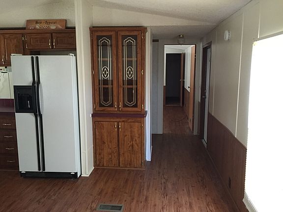 KITCHEN TO LAUNDRY ROOM AND MASTER