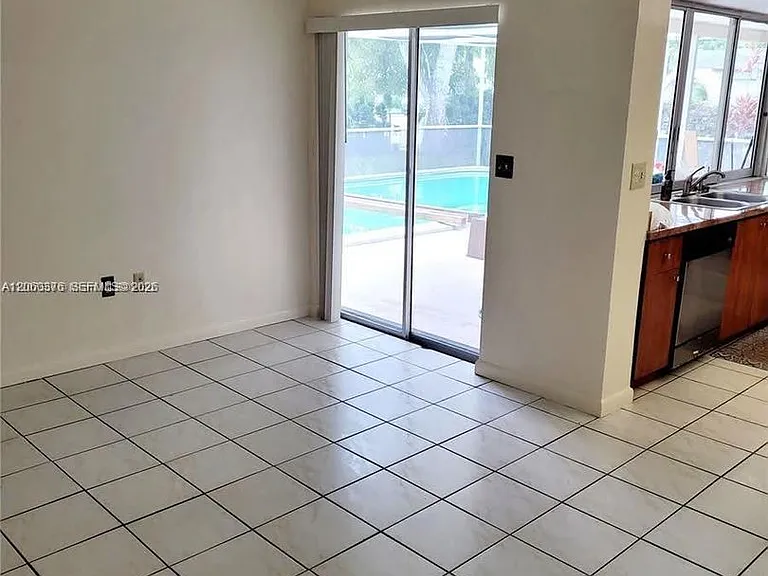 7590 NW 20th Ct — Photo 4