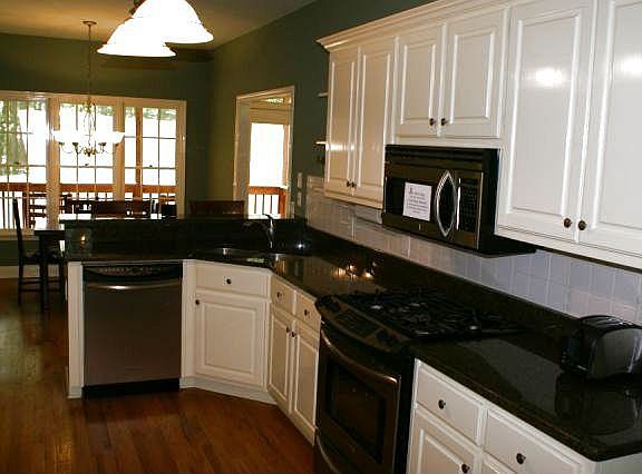 Updated kitchen with new stainless appliances, granite counters, lights 