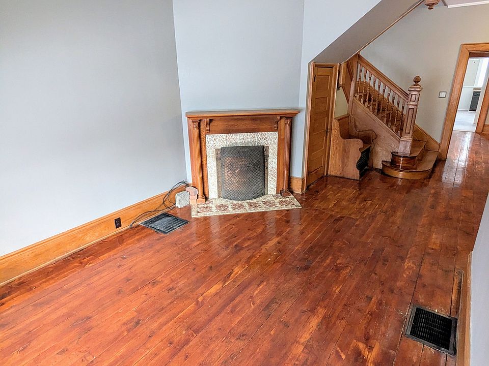 Living room with decorative fireplace