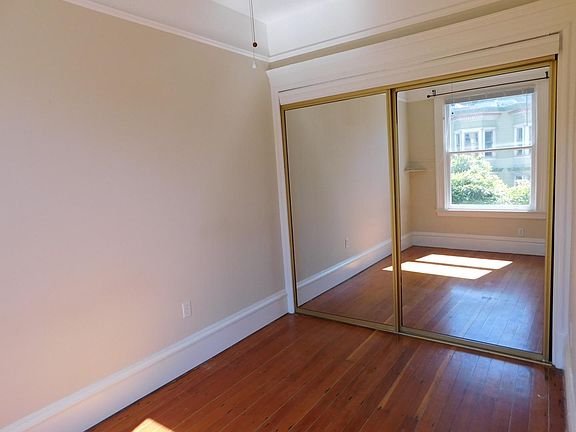 Sunny bedroom with large closet