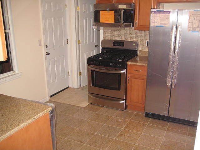 Kitchen w/ stainless steel appliances