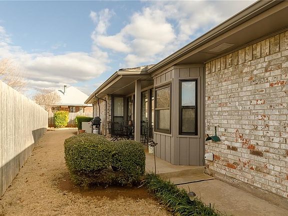Nice covered patio area is a private place to sit and have coffee or grill out.