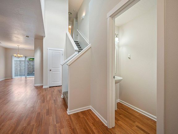 Gorgeous laminate floor and main level powder room.
