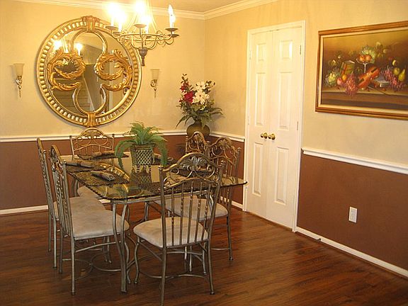 Spacious Dinning Room with laminated floors.