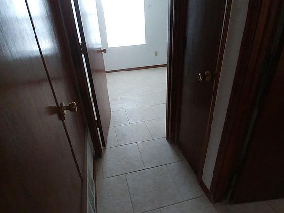 Hallway looking towards back bedroom