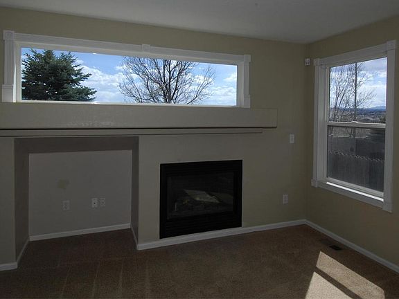 Mountain Views from Family Room Windows. (Can you see the sleeping man in the mo